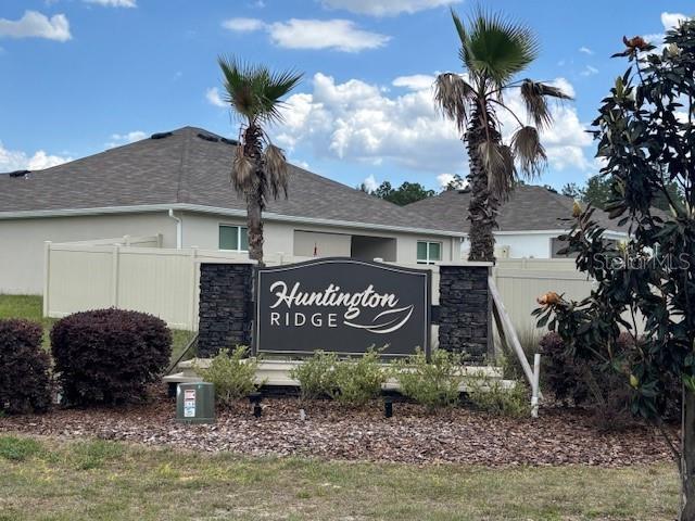 13677 Southwest 69th Terrace Ocala, FL 34473 - Photo 27 of 28 a sign board with a yard