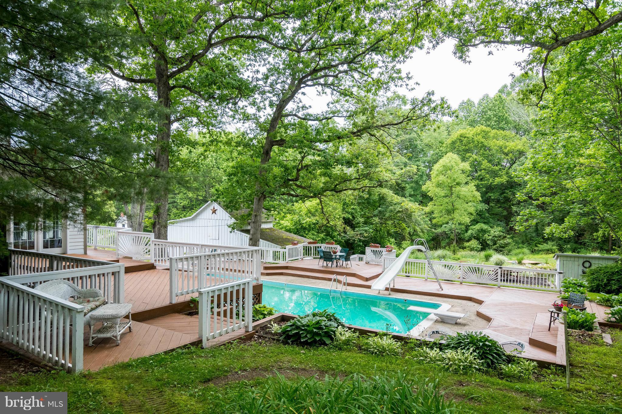 1118 Vale Road Bel Air, MD 21014 - Photo 25 of 30 SIde Yard/Garage View of Decks/Pool & Backyard