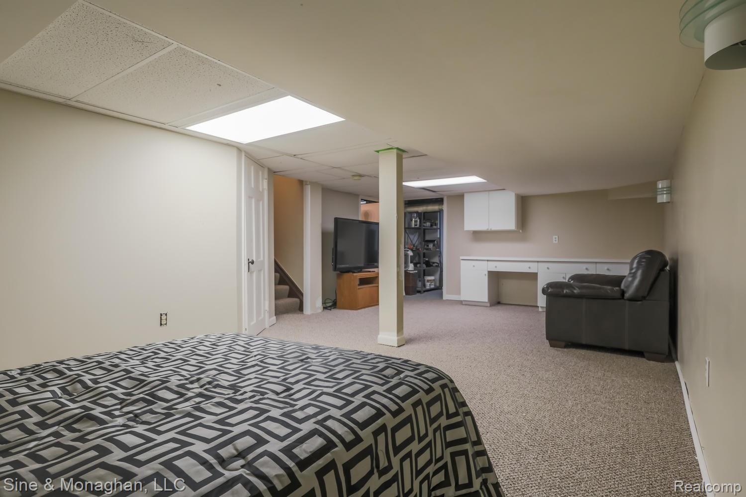 36 Colonial Road Grosse Pointe, MI 48236 - Photo 35 of 60 36 Colonial Rd REC ROOM TO STORAGE BATH AND SECOND LAUNDRY AREA.jpg