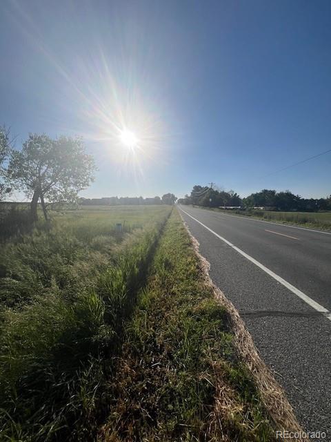 8523 Hygiene Road Longmont, CO 80503 - Photo 4 of 20 a view of a city street from a yard