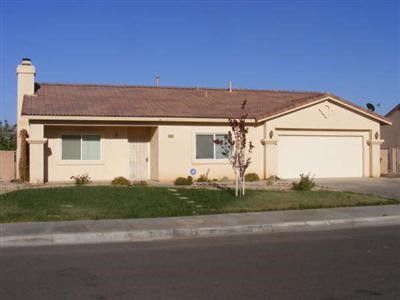 14247 Nanticoke Road Apple Valley, CA 92307 - Photo 1 of 1 front view of a house with a road