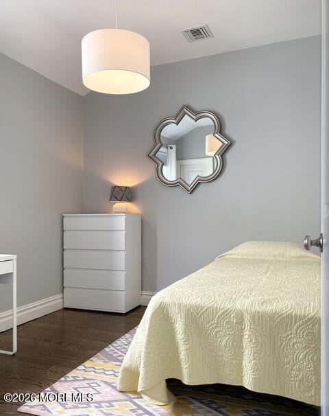 18 Meadowbrook Avenue Rumson, NJ 07760 - Photo 11 of 19 a bedroom with a bed and a chair