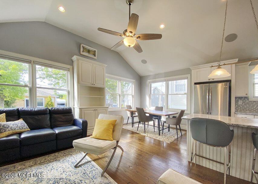 18 Meadowbrook Avenue Rumson, NJ 07760 - Photo 5 of 19 a living room with furniture two window and a dining table