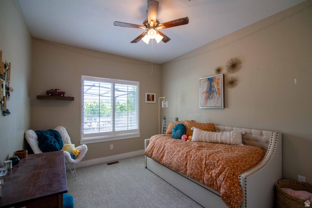 646 East 1400th Street North Mapleton, UT 84664 - Photo 33 of 78 Room featuring wall-to-wall carpeting and a ceiling fan with integrated lighting