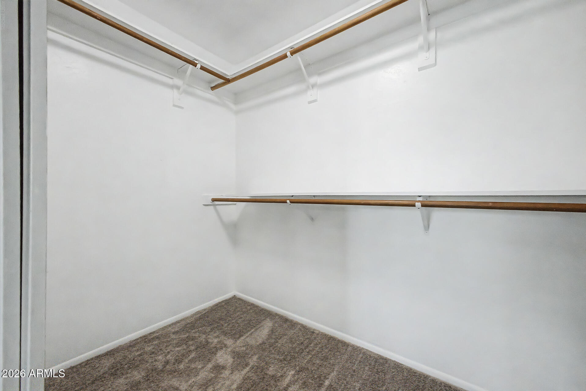 2455 East Broadway Road, Unit 103 Mesa, AZ 85204 - Photo 14 of 22 a view of a room with shelf in it