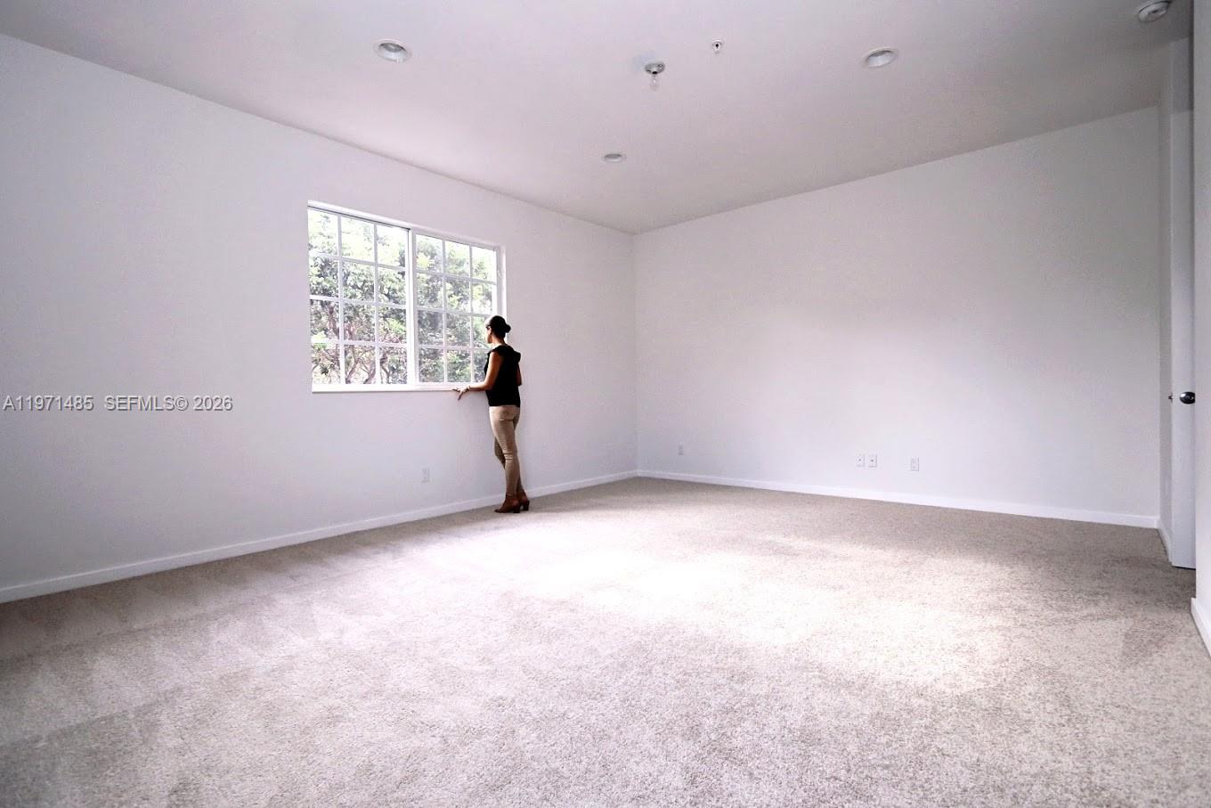 2844 Southwest 81st Terrace, Unit 2840 Miramar, FL 33025 - Photo 9 of 10 an empty room with windows