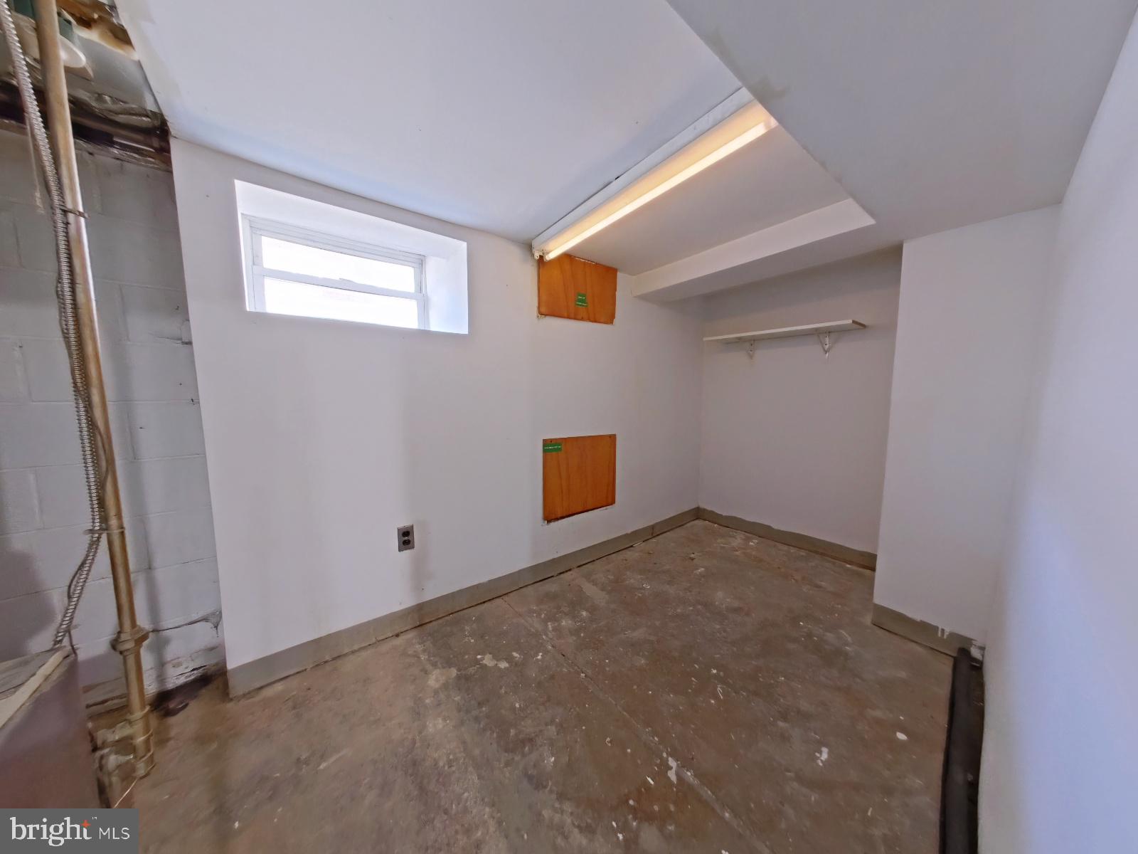 4013 Higbee Street Philadelphia, PA 19135 - Photo 33 of 39 Front Room - Basement