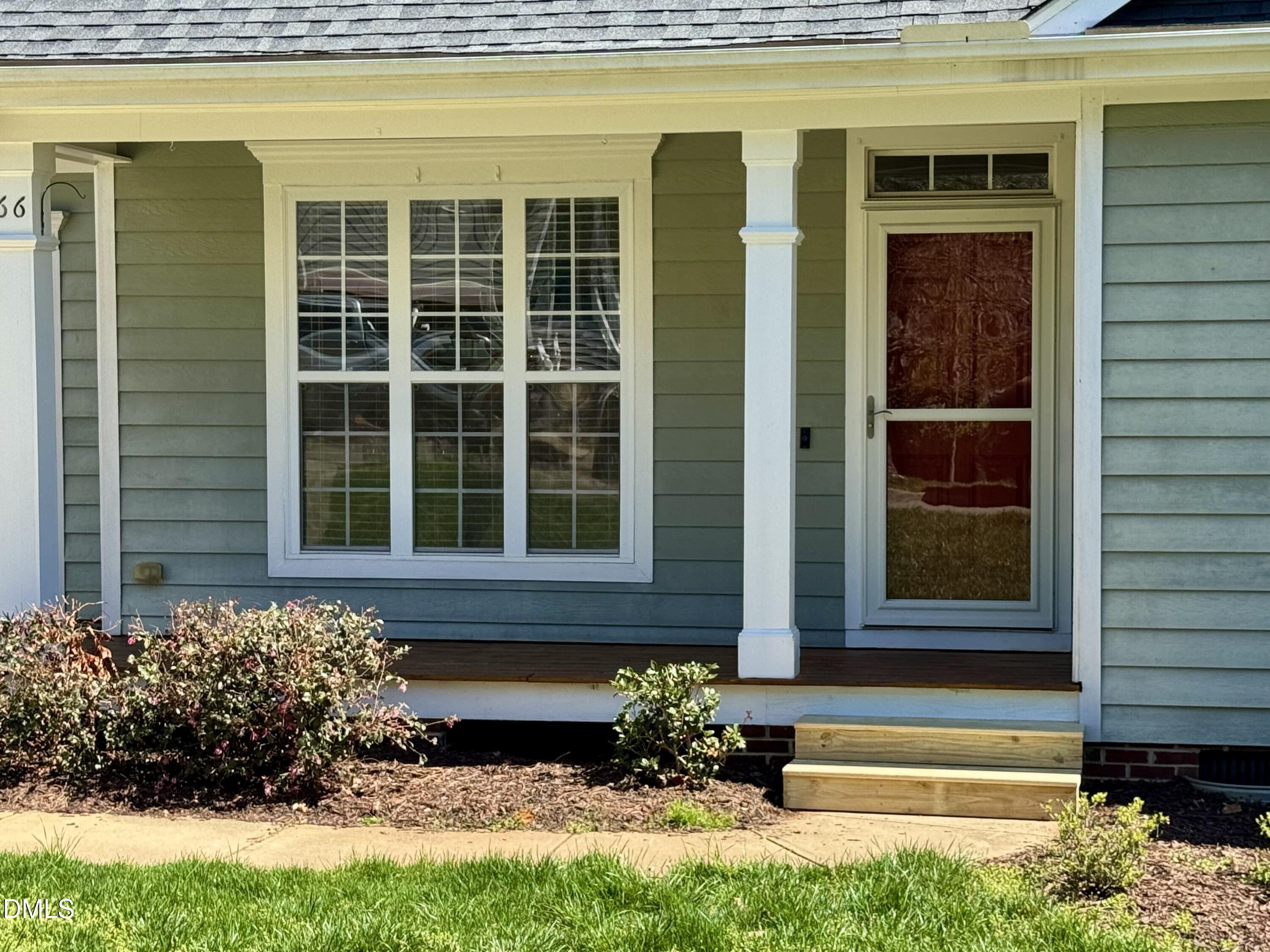 66 Bellemont Road Pittsboro, NC 27312 - Photo 2 of 33 a front view of a house with a yard