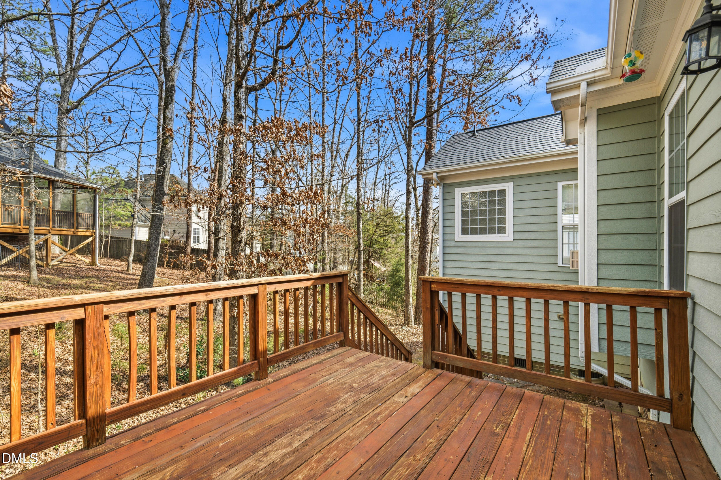 66 Bellemont Road Pittsboro, NC 27312 - Photo 27 of 33 a view of a wooden balcony with wooden floor and fence