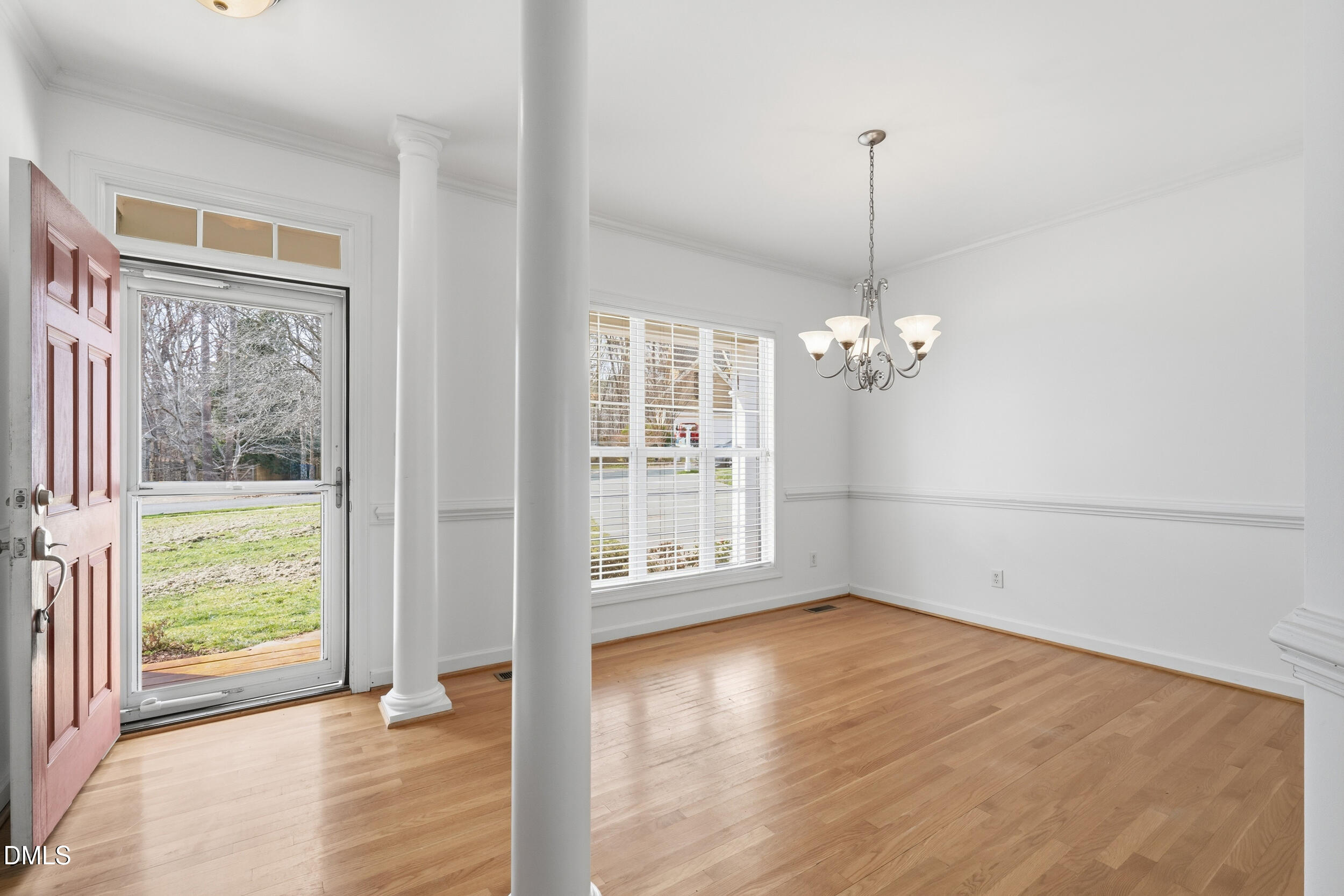 66 Bellemont Road Pittsboro, NC 27312 - Photo 3 of 33 a view of a livingroom with wooden floor and a window