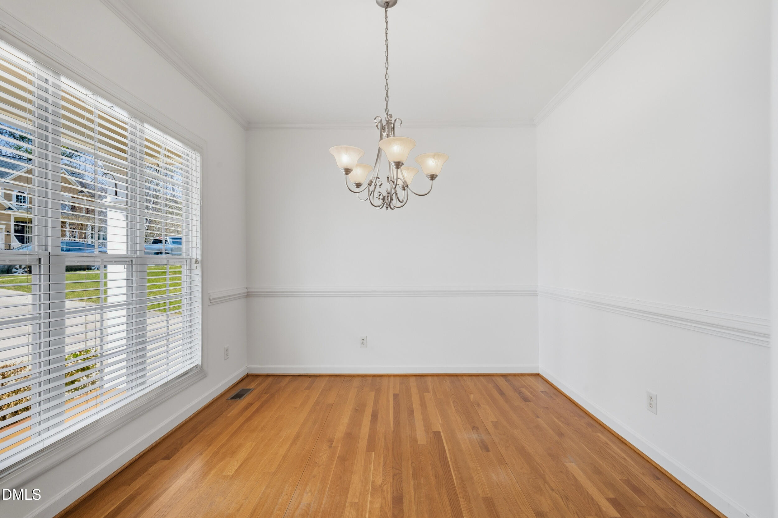 66 Bellemont Road Pittsboro, NC 27312 - Photo 5 of 33 a view of empty room with wooden floor and fan