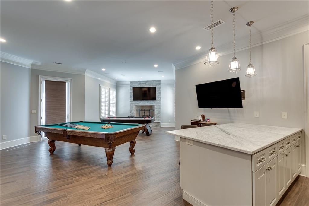 187 Fontaine Road Southwest Mableton, GA 30126 - Photo 60 of 84 a room with pool table flat screen tv and wooden floor