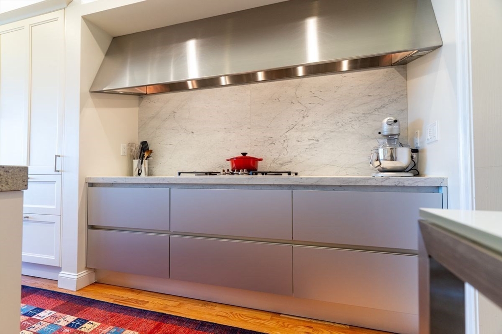 1 South Cottage Road, Unit 1 Belmont, MA 02478 - Photo 14 of 35 a bathroom with a bathtub and a shower