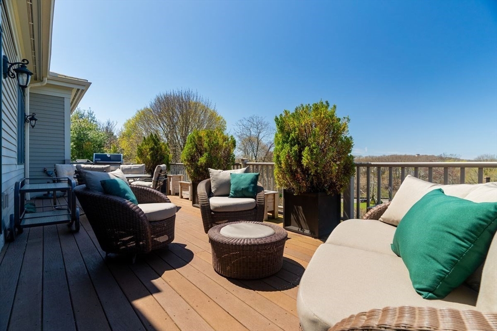 1 South Cottage Road, Unit 1 Belmont, MA 02478 - Photo 29 of 35 a view of balcony with outdoor seating and city view