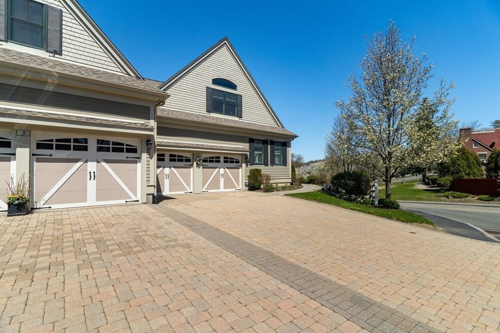 1 South Cottage Road, Unit 1 Belmont, MA 02478 - Photo 31 of 35 a view of a house with basketball court