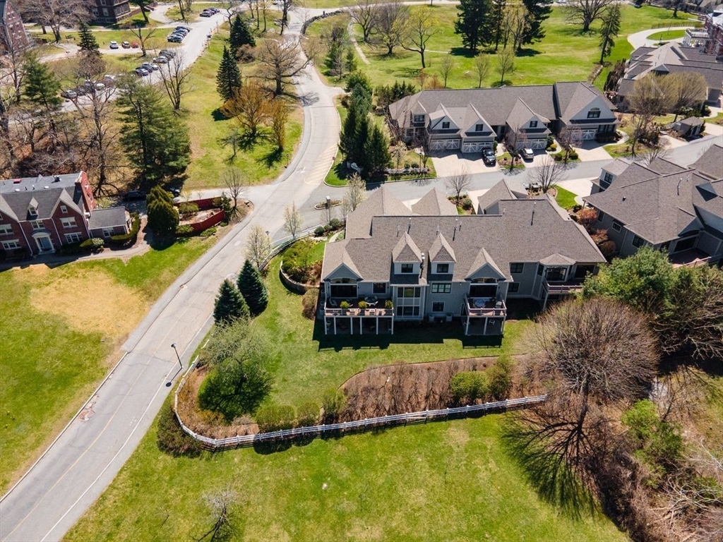1 South Cottage Road, Unit 1 Belmont, MA 02478 - Photo 32 of 35 an aerial view of a house with a garden and swimming pool