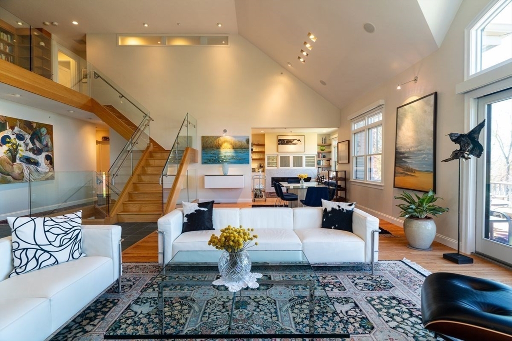 1 South Cottage Road, Unit 1 Belmont, MA 02478 - Photo 5 of 35 a living room with furniture and a rug