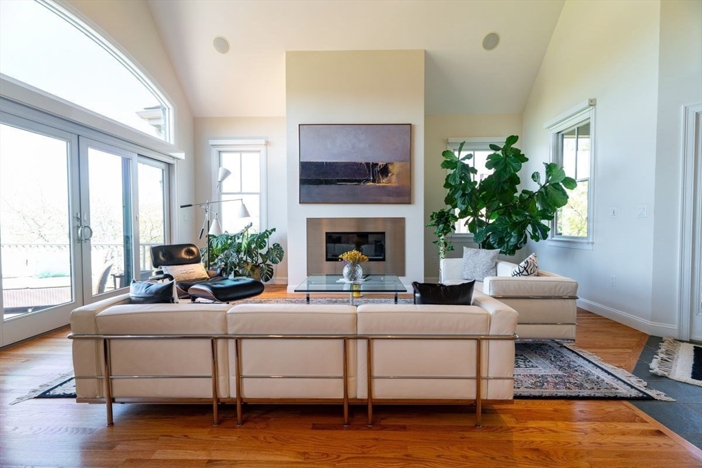1 South Cottage Road, Unit 1 Belmont, MA 02478 - Photo 6 of 35 a living room with furniture fireplace and window