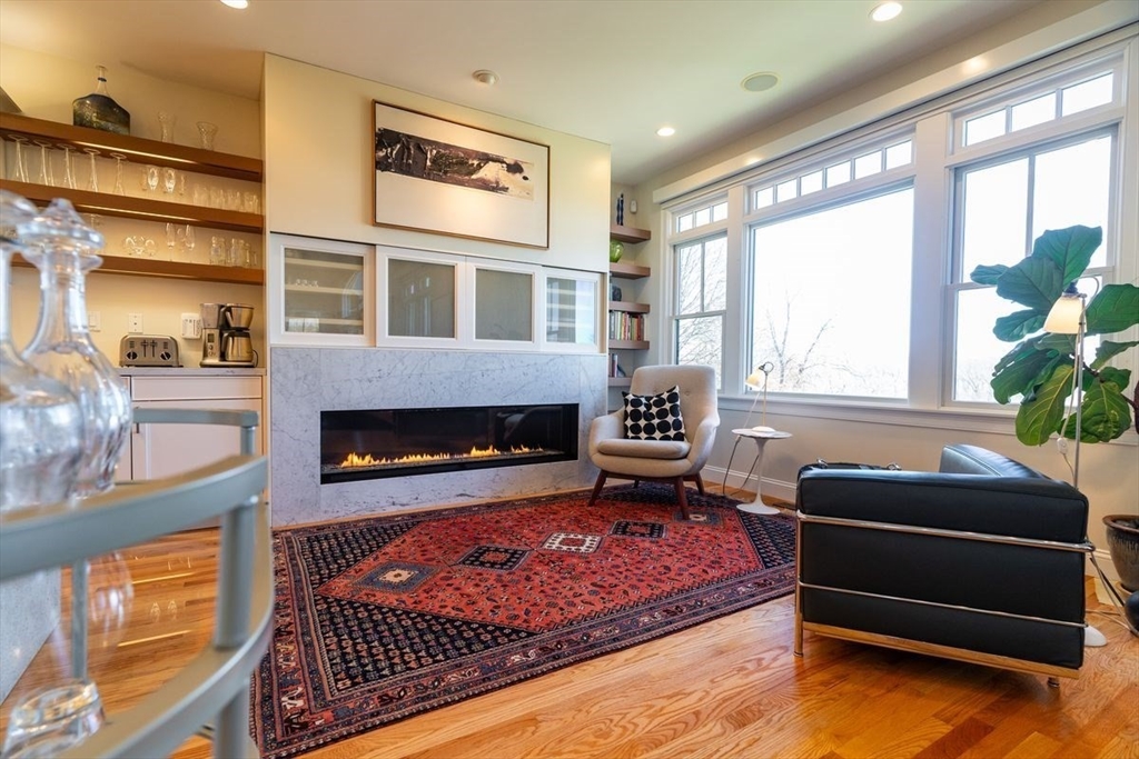 1 South Cottage Road, Unit 1 Belmont, MA 02478 - Photo 10 of 35 a living room with furniture rug and window
