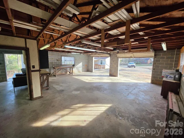 a kitchen with cabinets a sink and appliances
