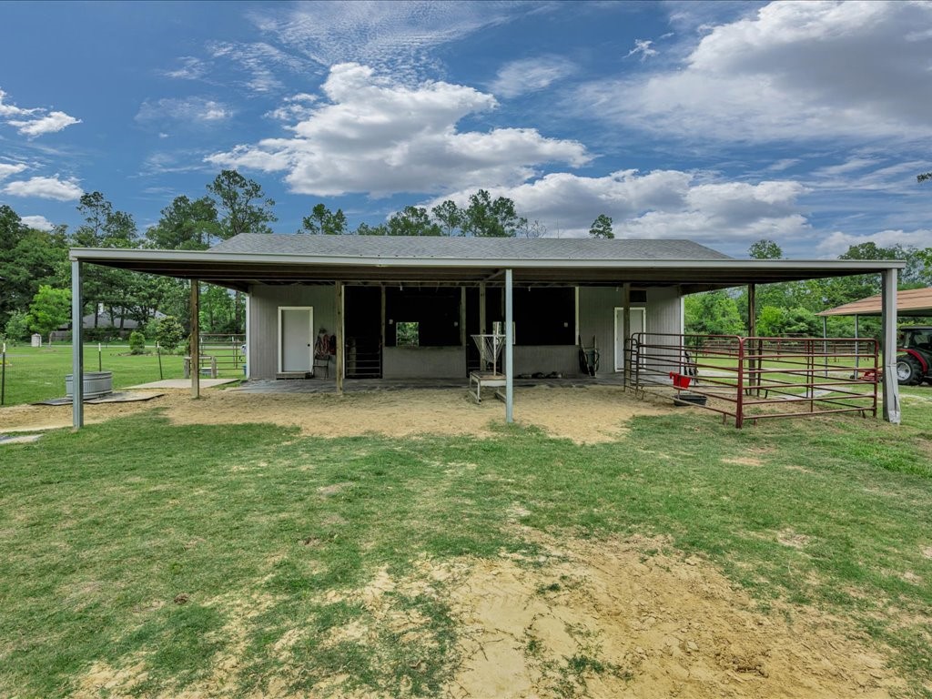 104 Wheeler Road Lufkin, TX 75901 - Photo 29 of 45 a view of a house with backyard and porch