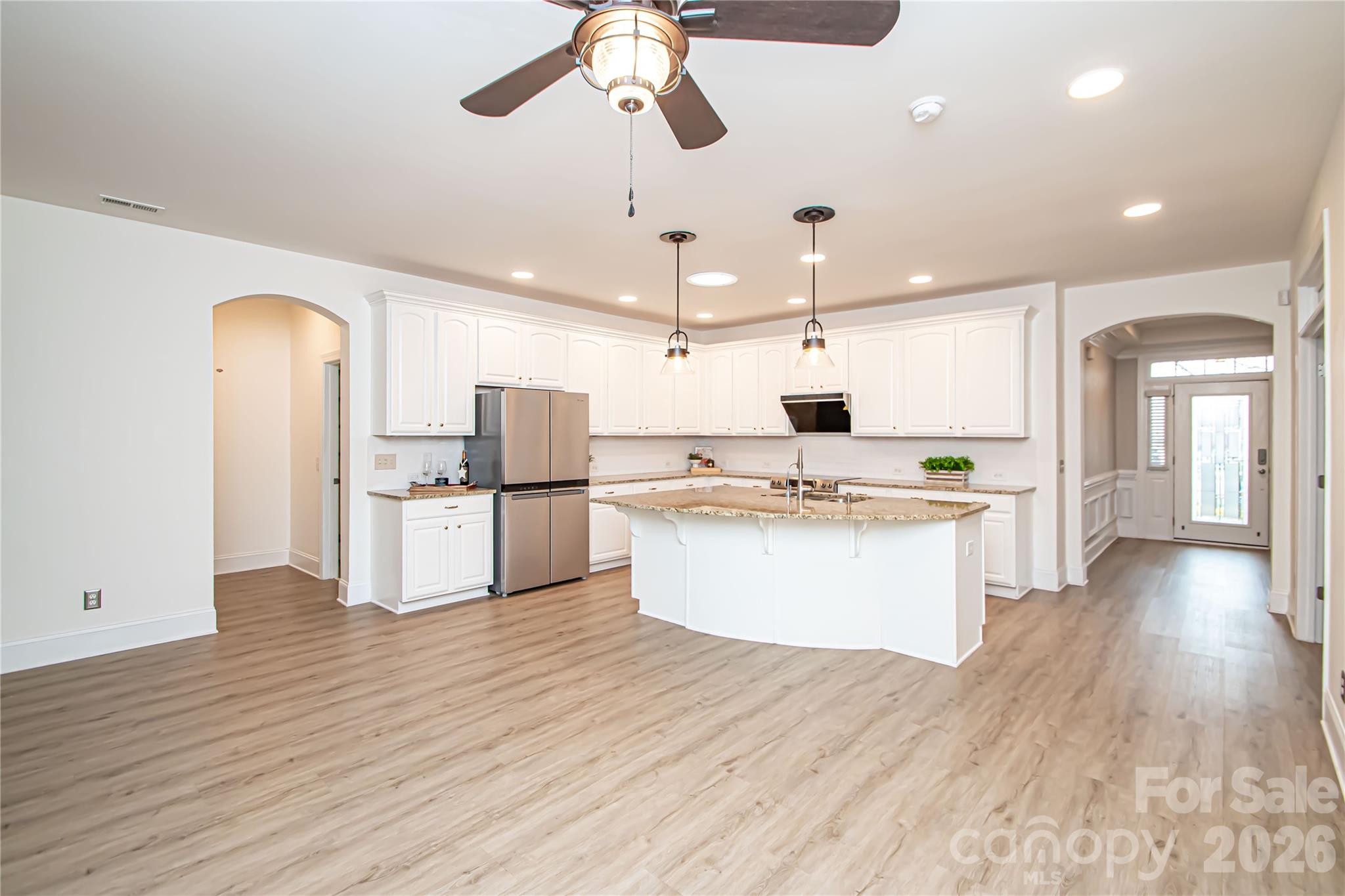 7900 Honey Fig Road Charlotte, NC 28277 - Photo 17 of 48 a view of kitchen with refrigerator microwave and stove