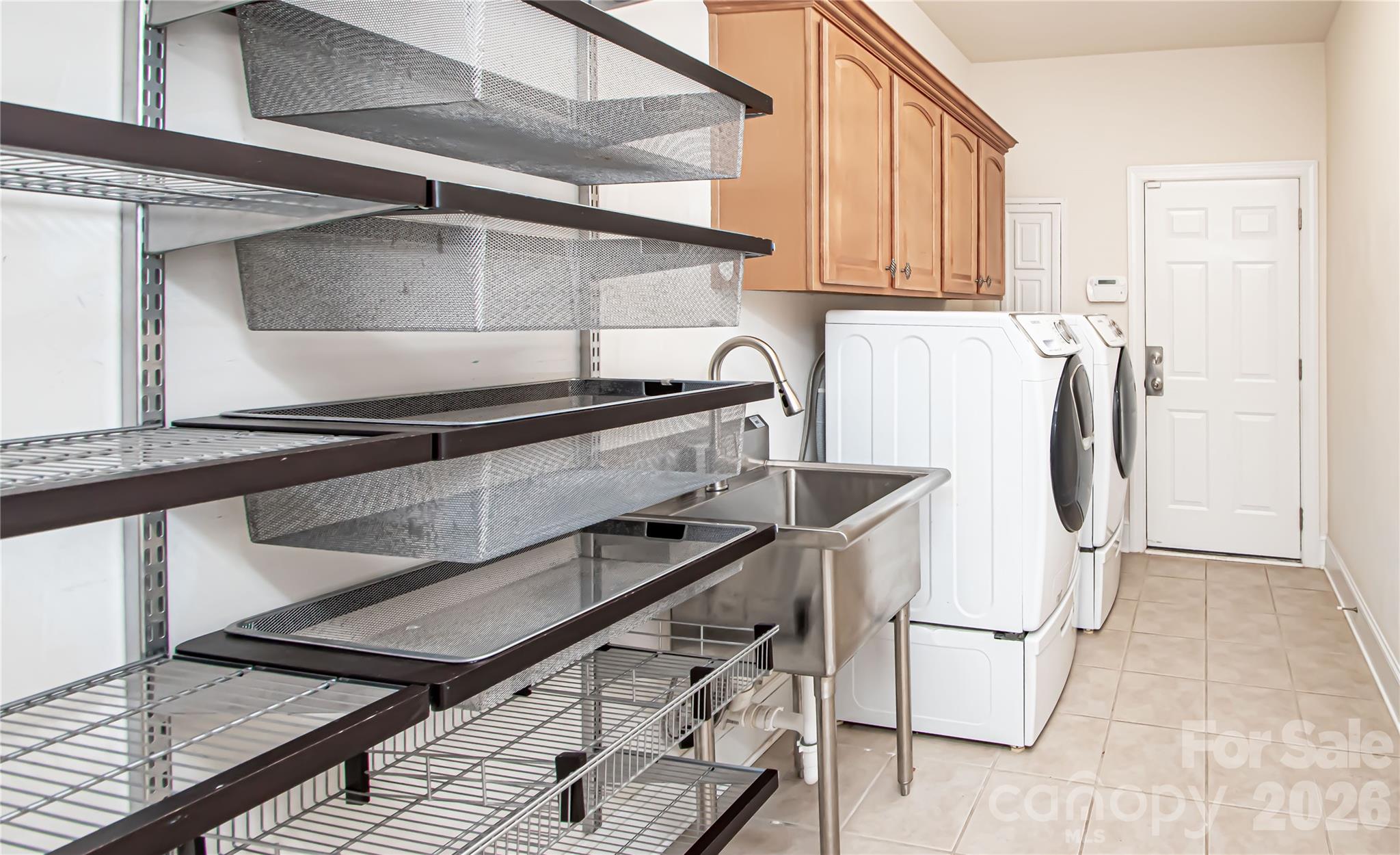 7900 Honey Fig Road Charlotte, NC 28277 - Photo 34 of 48 a utility room with dryer and washer