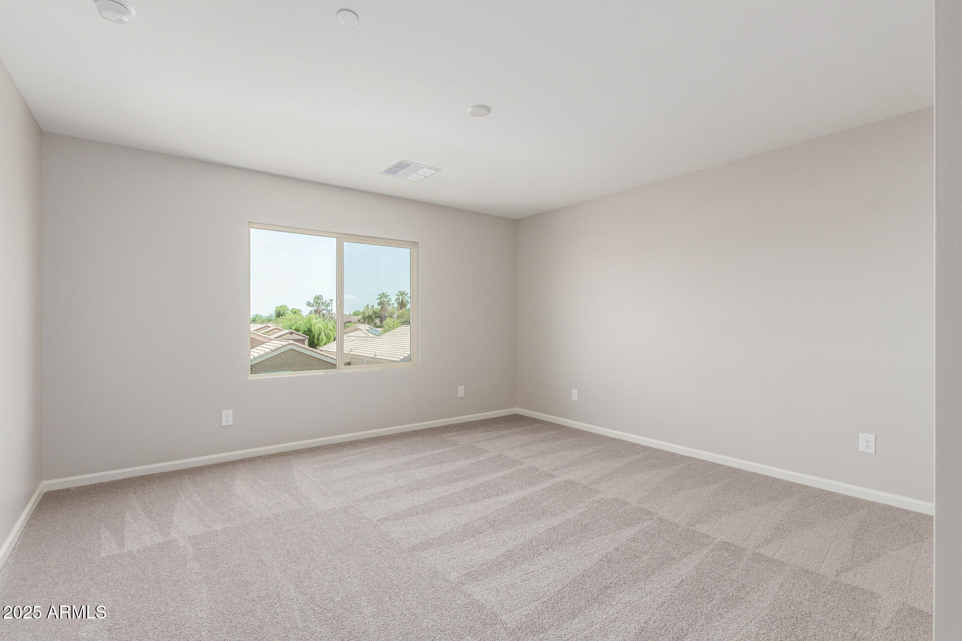 733 East Commonwealth Avenue, Unit 29 Chandler, AZ 85225 - Photo 12 of 37 a view of an empty room with a window