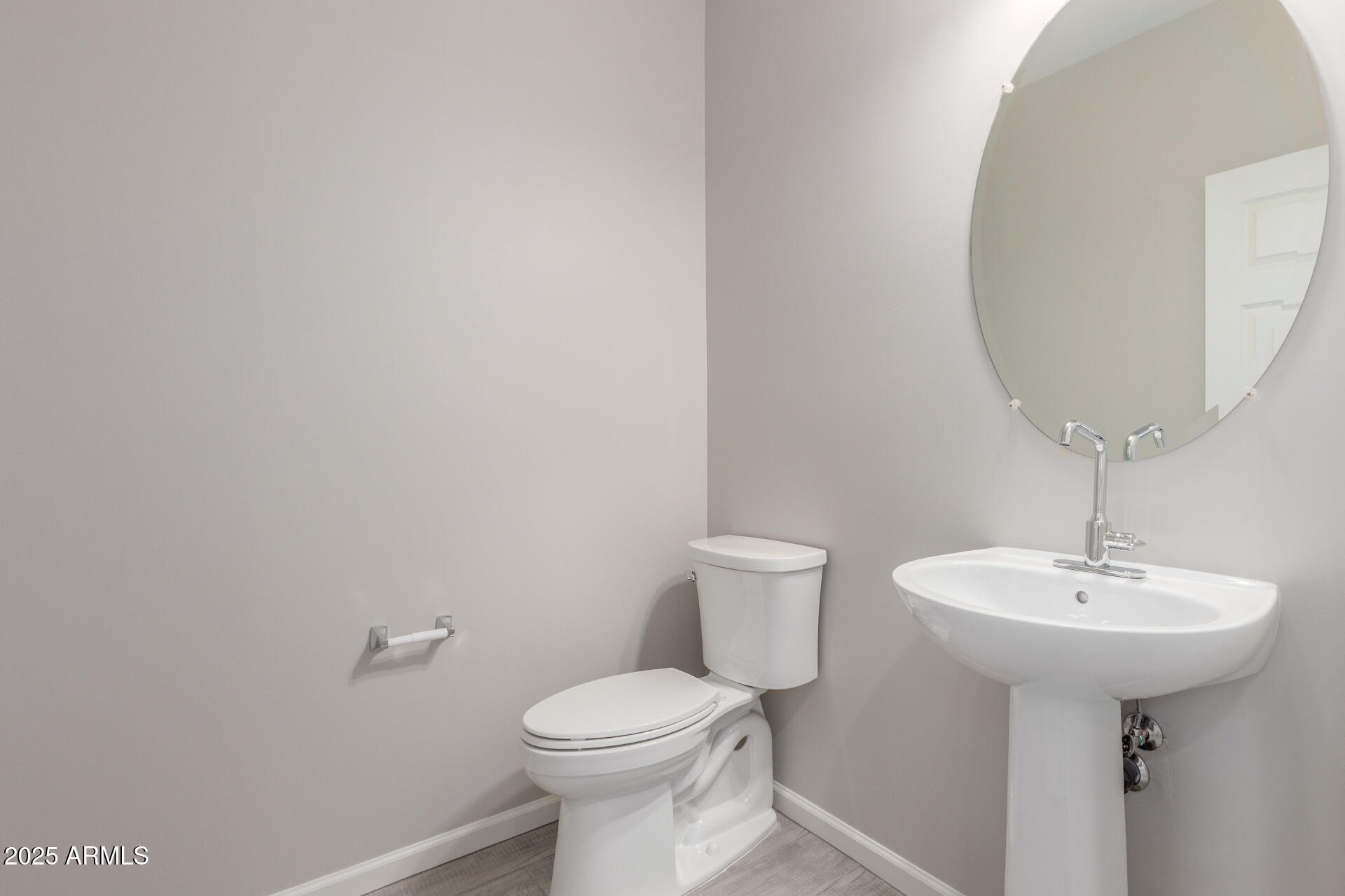 733 East Commonwealth Avenue, Unit 29 Chandler, AZ 85225 - Photo 8 of 37 a bathroom with a sink a toilet and mirror