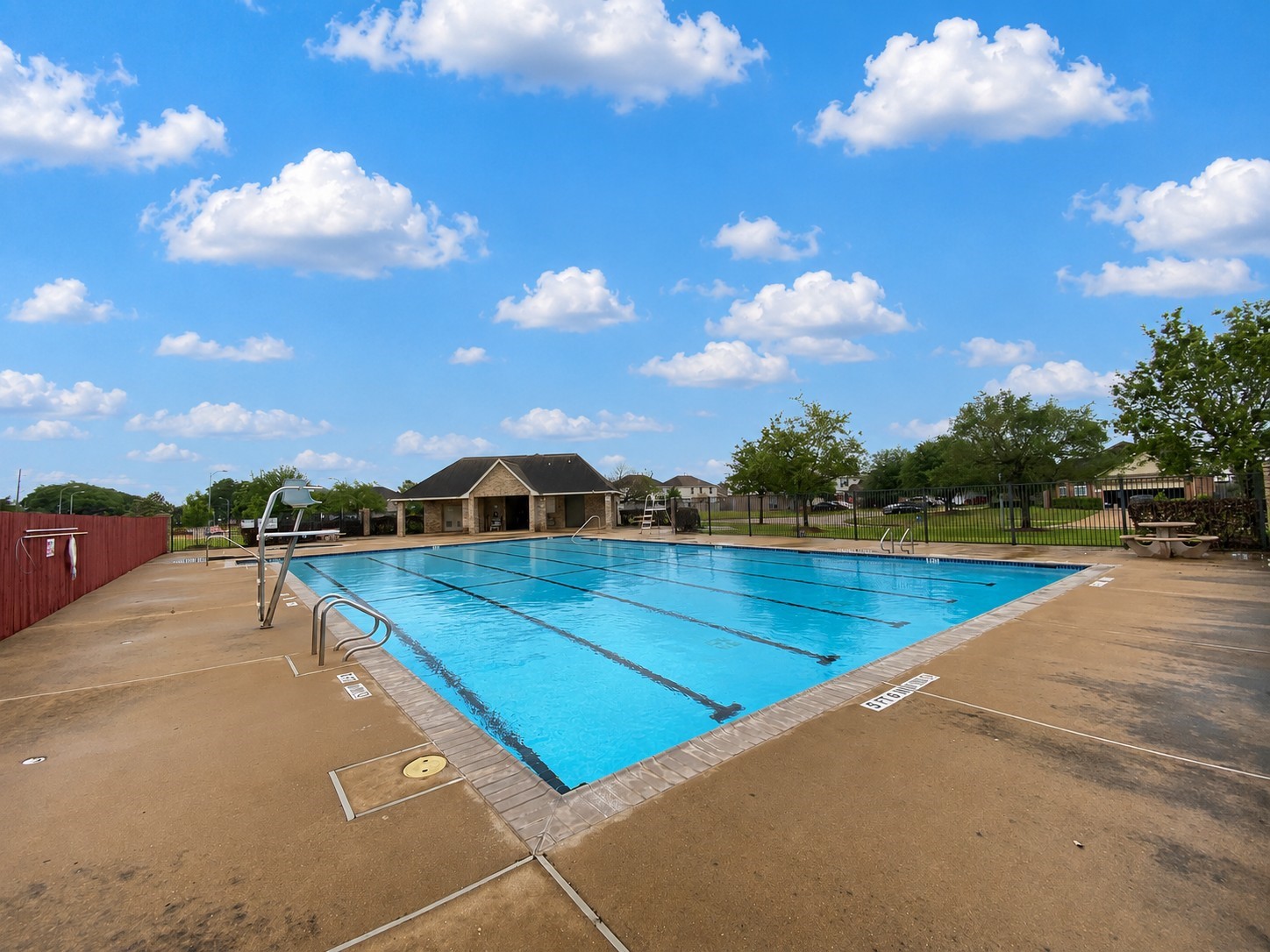 19422 Harvest Stream Way Houston, TX 77084 - Photo 37 of 41 Dive into summer fun at the inviting Lake Ridge community pool, perfect for sun-soaked relaxation and refreshing swims!