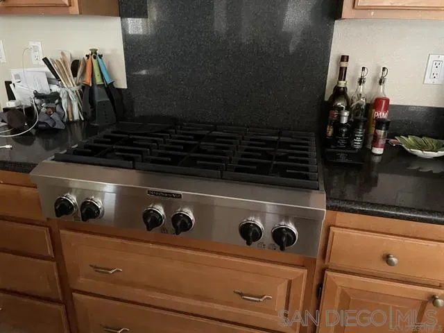 a close view of stove top oven and microwave