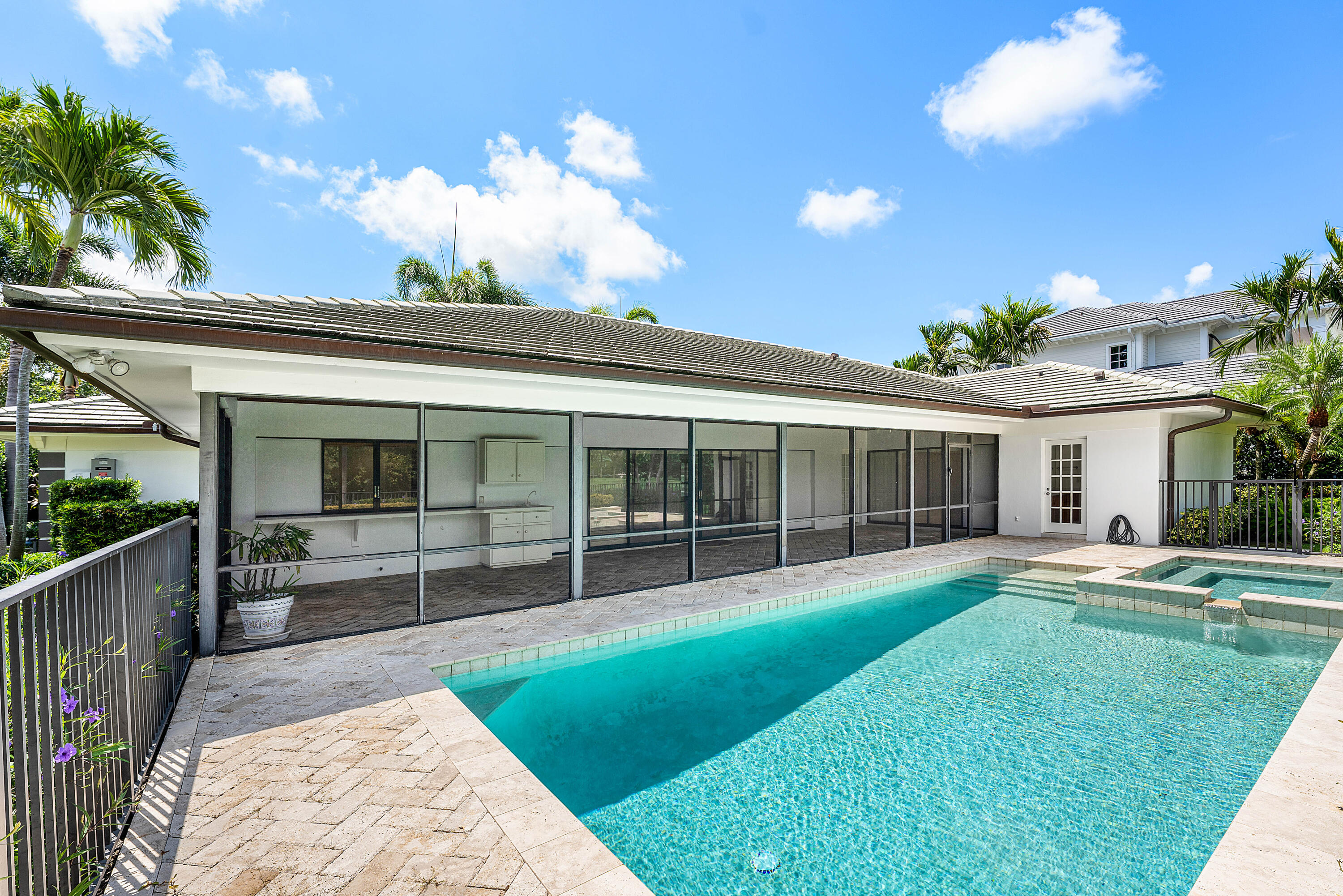 1851 Thatch Palm Drive Boca Raton, FL 33432 - Photo 52 of 70 a view of a house with a yard and sitting area