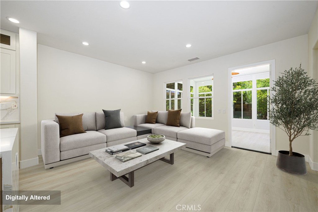 15 Plum Street Ladera Ranch, CA 92694 - Photo 28 of 113 a living room with furniture and a large window
