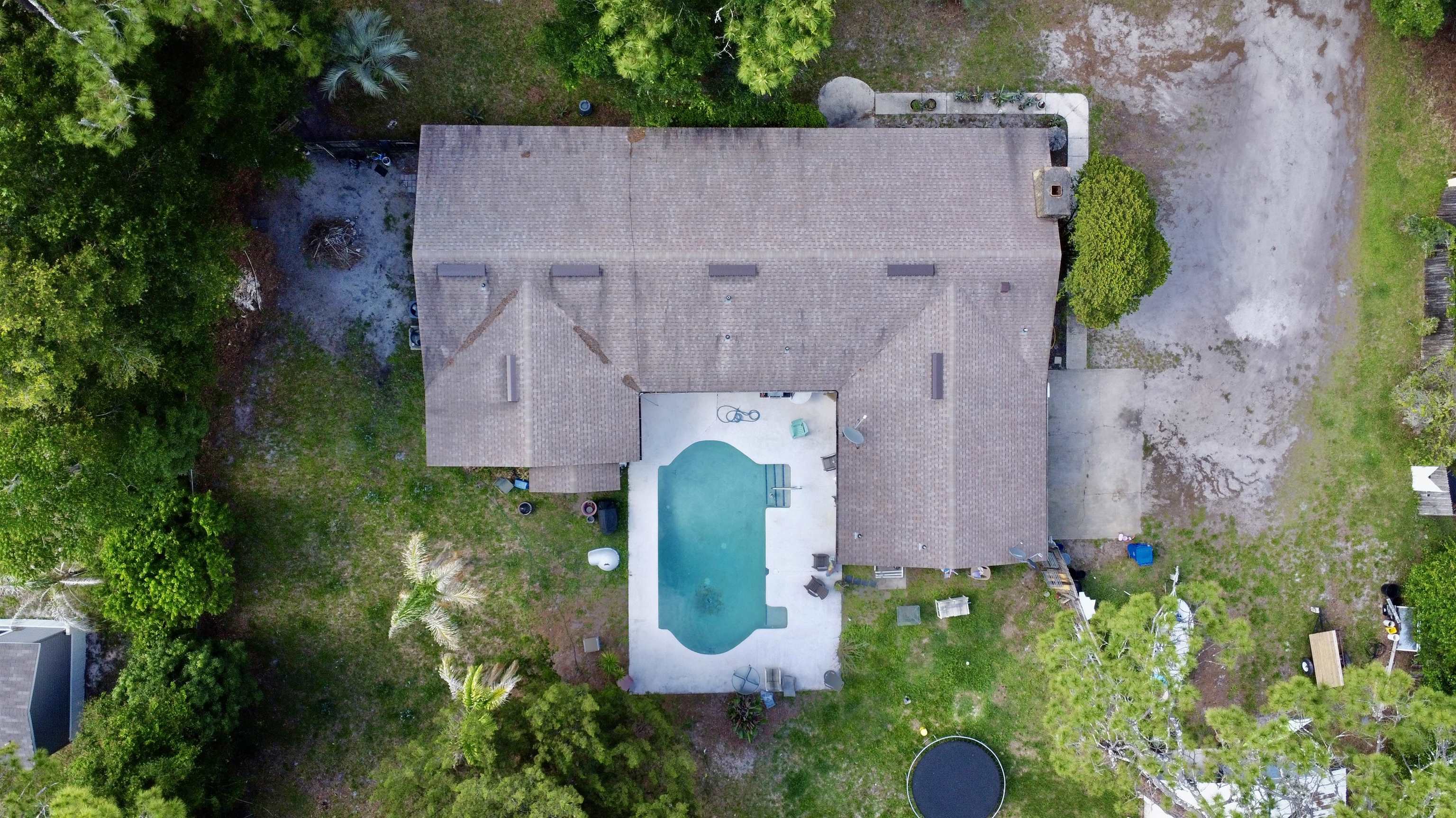 554 Hayley Road St. Augustine, FL 32086 - Photo 38 of 46 an aerial view of a house with a swimming pool