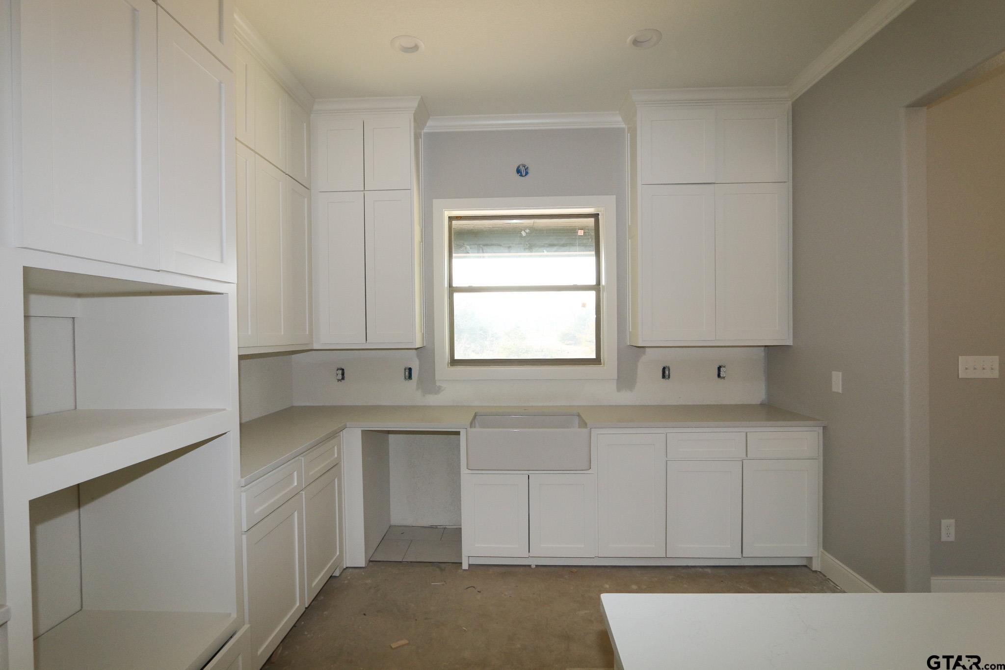 16445 Cooper Way Flint, TX 75762 - Photo 18 of 33 a kitchen with a sink cabinets and window