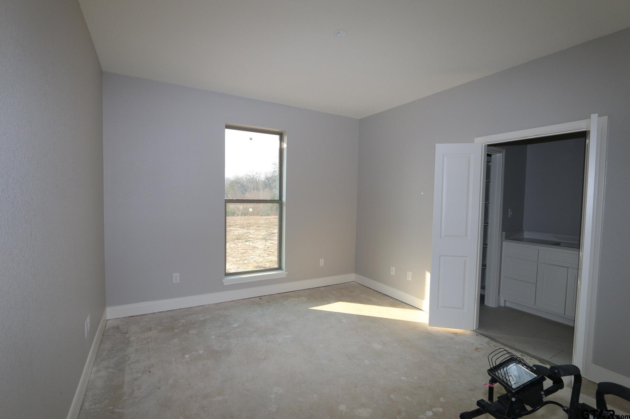 16445 Cooper Way Flint, TX 75762 - Photo 30 of 33 an empty room with windows