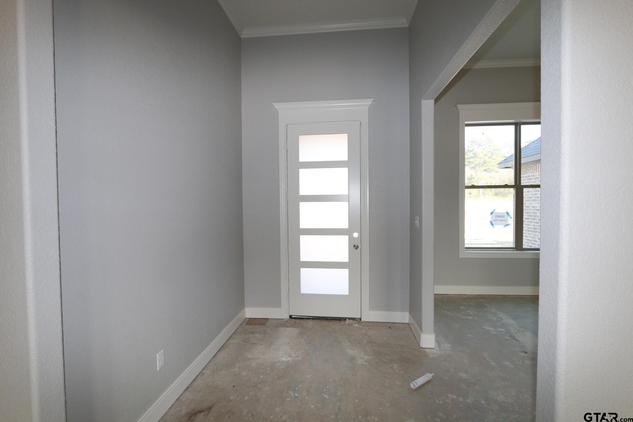 16445 Cooper Way Flint, TX 75762 - Photo 9 of 33 an empty room that has a window