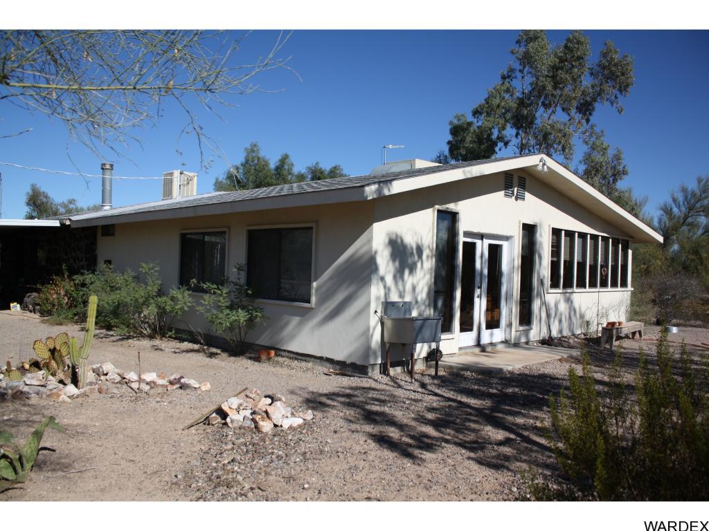 44411 East Perry Lane Salome, AZ 85348 - Photo 1 of 26 a view of a house with backyard