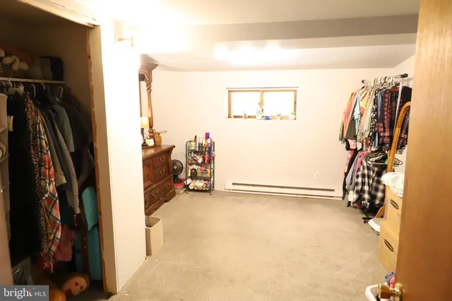 a bathroom with a sink and a shower curtain