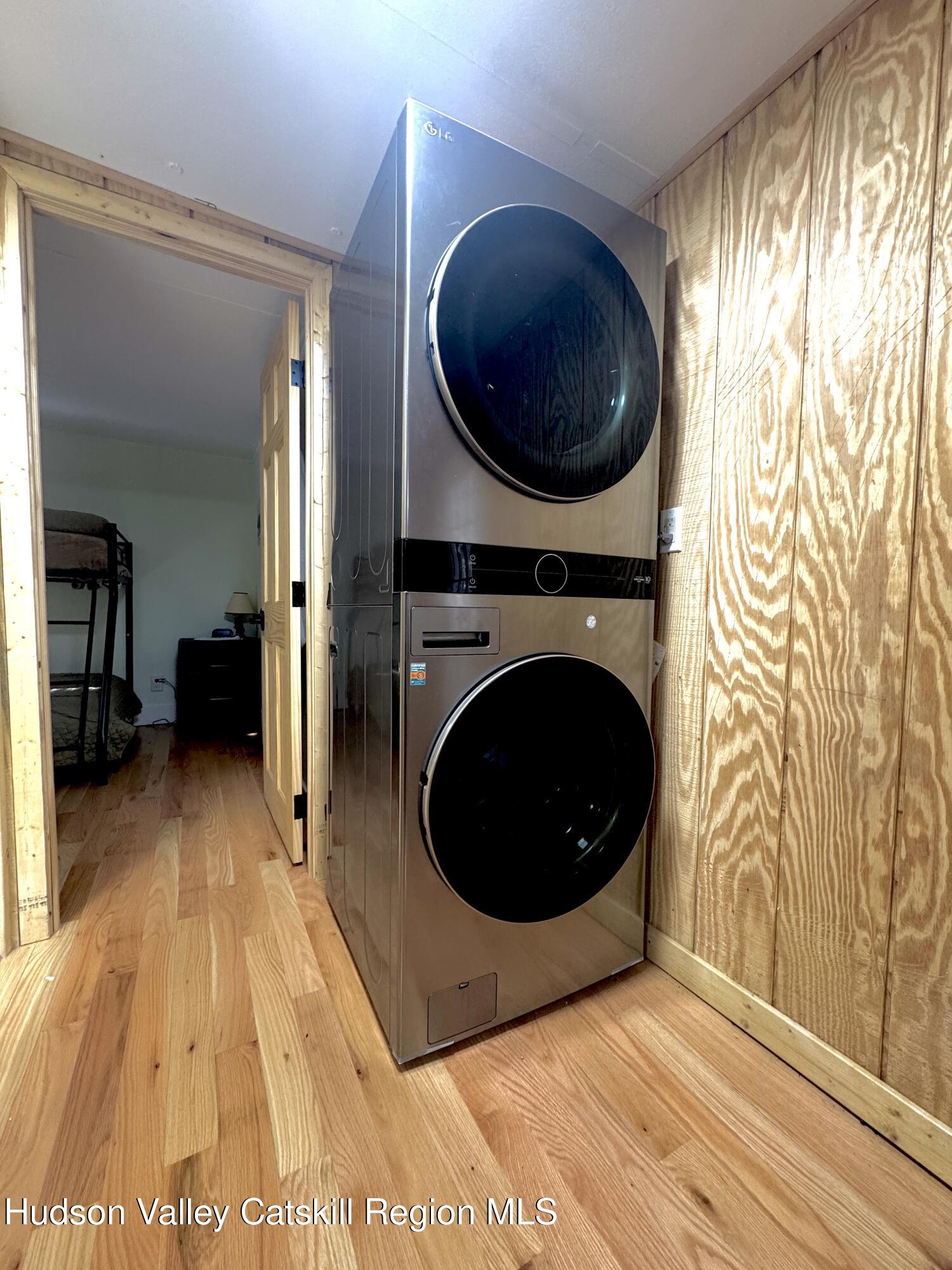 50 Harris Road Kerhonkson, NY 12446 - Photo 11 of 28 a view of a living room with washer and dryer
