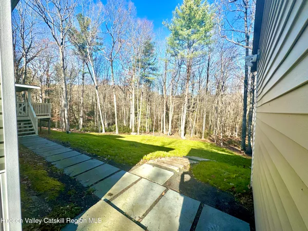 a view of a park with large trees