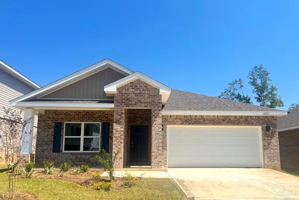 a front view of a house with a garage