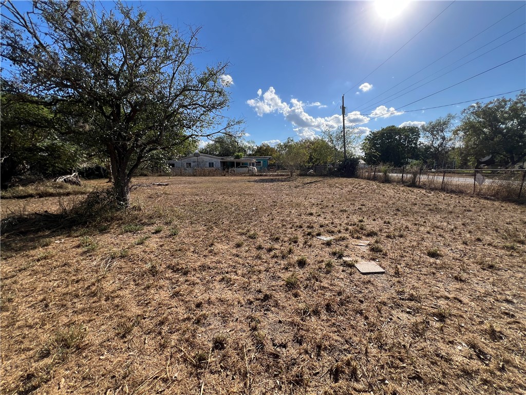 113 4th Street Mathis, TX 78368 - Photo 7 of 13 a view of a yard