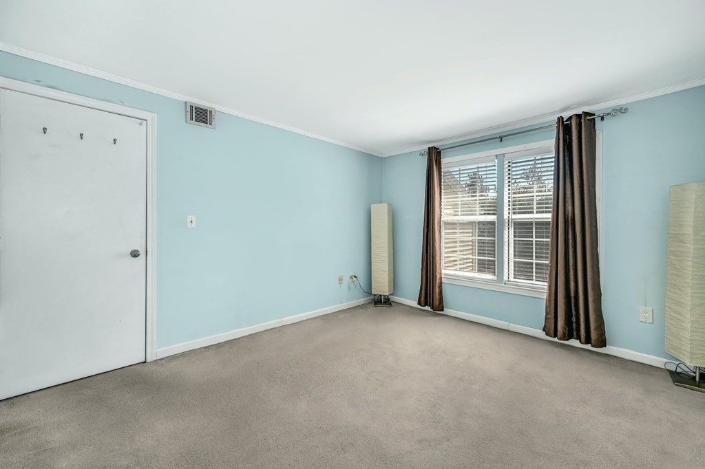 4 Walden Drive, Unit 19 Natick, MA 01760 - Photo 22 of 42 a view of an empty room with a window