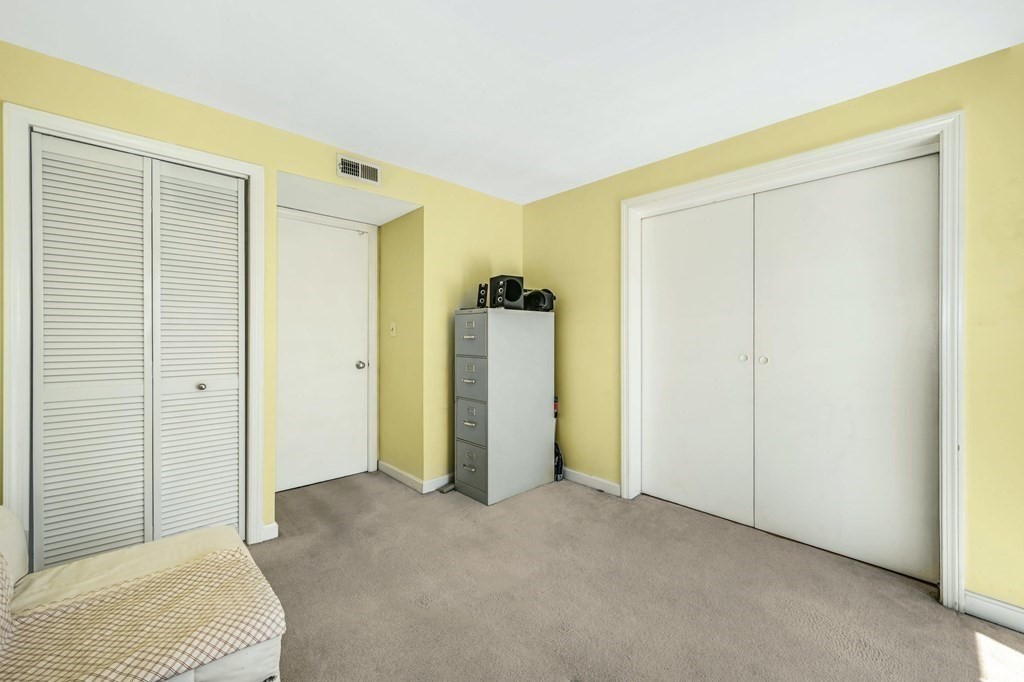 4 Walden Drive, Unit 19 Natick, MA 01760 - Photo 27 of 42 a view of a room with closet and wooden floor