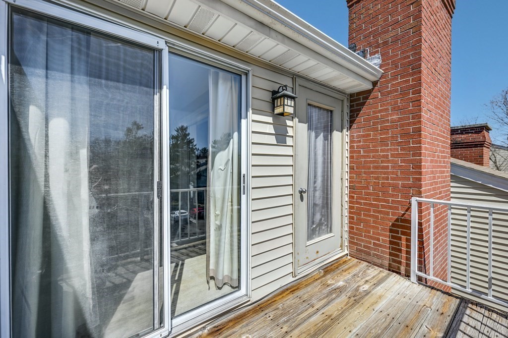 4 Walden Drive, Unit 19 Natick, MA 01760 - Photo 29 of 42 a view of a door and a window