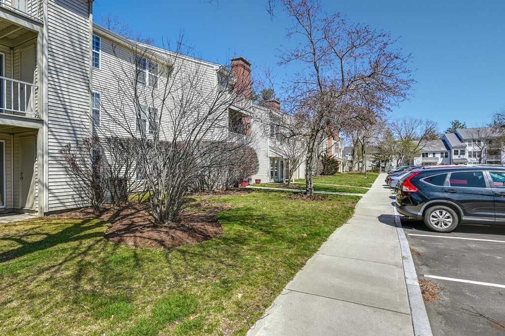 4 Walden Drive, Unit 19 Natick, MA 01760 - Photo 32 of 42 a car parked in front of a house