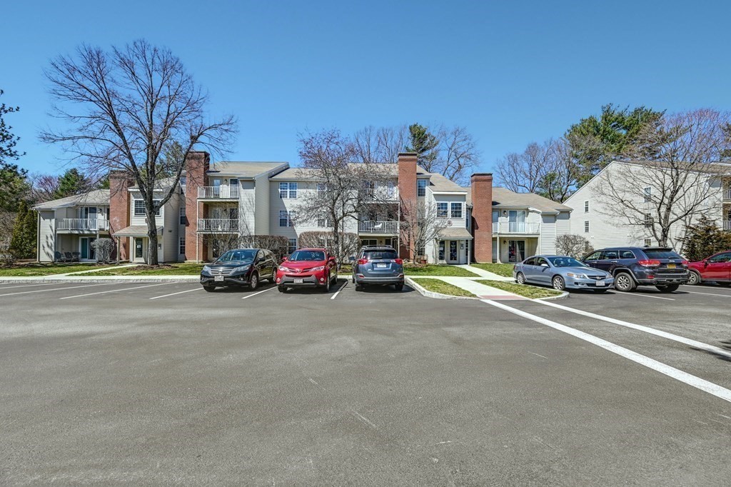 4 Walden Drive, Unit 19 Natick, MA 01760 - Photo 33 of 42 a car parked on the side of a street