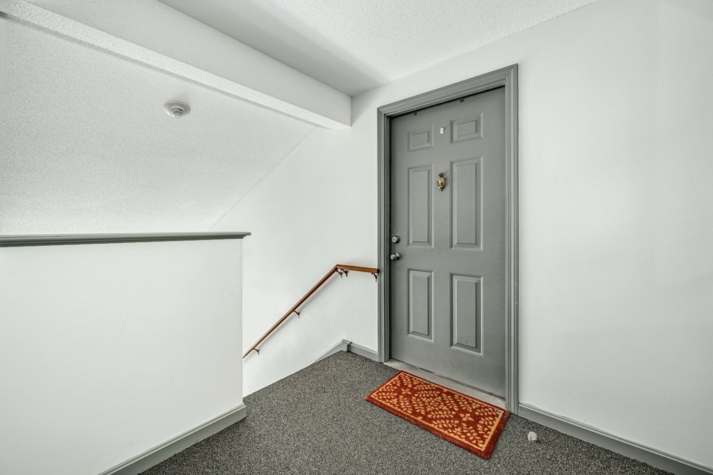 4 Walden Drive, Unit 19 Natick, MA 01760 - Photo 5 of 42 a view of a hallway with entryway