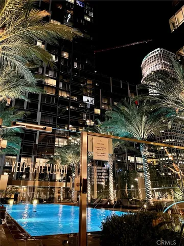 a view of a hallway and a livingroom with a furniture